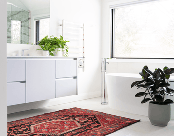 contemporary bathroom chrome hardware white cabinetry