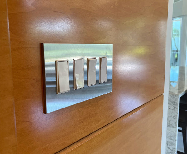 stainless steel 4gang modern switch plate cover from kul grilles on modern wall