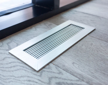 anodized clear kul grilles hvac vent cover on hardwood floor