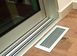 floor vent cover register anodized clear finish on hardwood floor by anodized window casing close up dwell by kulgrilles