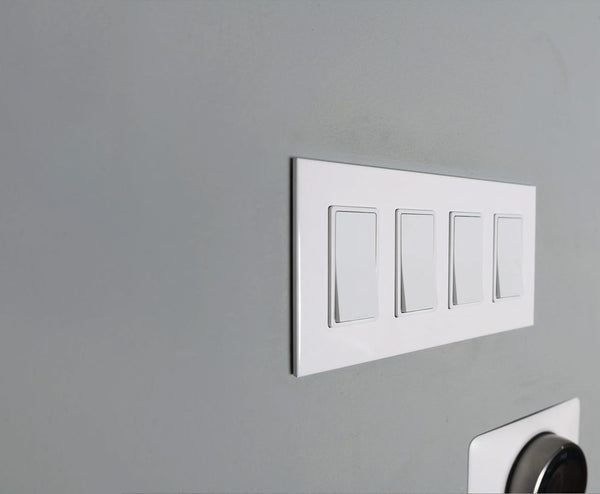 glacier frost white 4gang light switch cover from kul grilles on modern wall