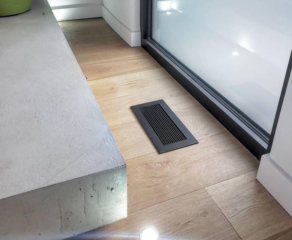 air vent covers black monolith finish light hardwood floor black casings SMPL 52 morningside by kulgrilles