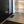 heat register black monolith modern entrance tile-floor black door casings brick wall by kulgrilles