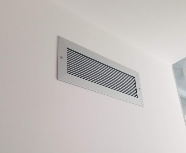 wall vent cover anodized clear on white wall by kulgrilles